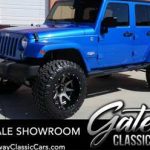 2015 Jeep Wrangler Sahara 3.6L V6 SFI DOHC 24V 5-Speed Automatic Call For Availability on Boost Your Ad - Custom Cars For Sale, Inc. www.carstrucksbikesandboats.com