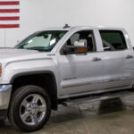 2015 GMC Sierra 2500HD SLT 4x4 4dr Crew Cab SB Kentwood, MI on www.carstrucksbikesandboats.com