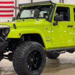 2016 Jeep Wrangler Sahara Unlimited Kentwood, MI on www.carstrucksbikesandboats.com